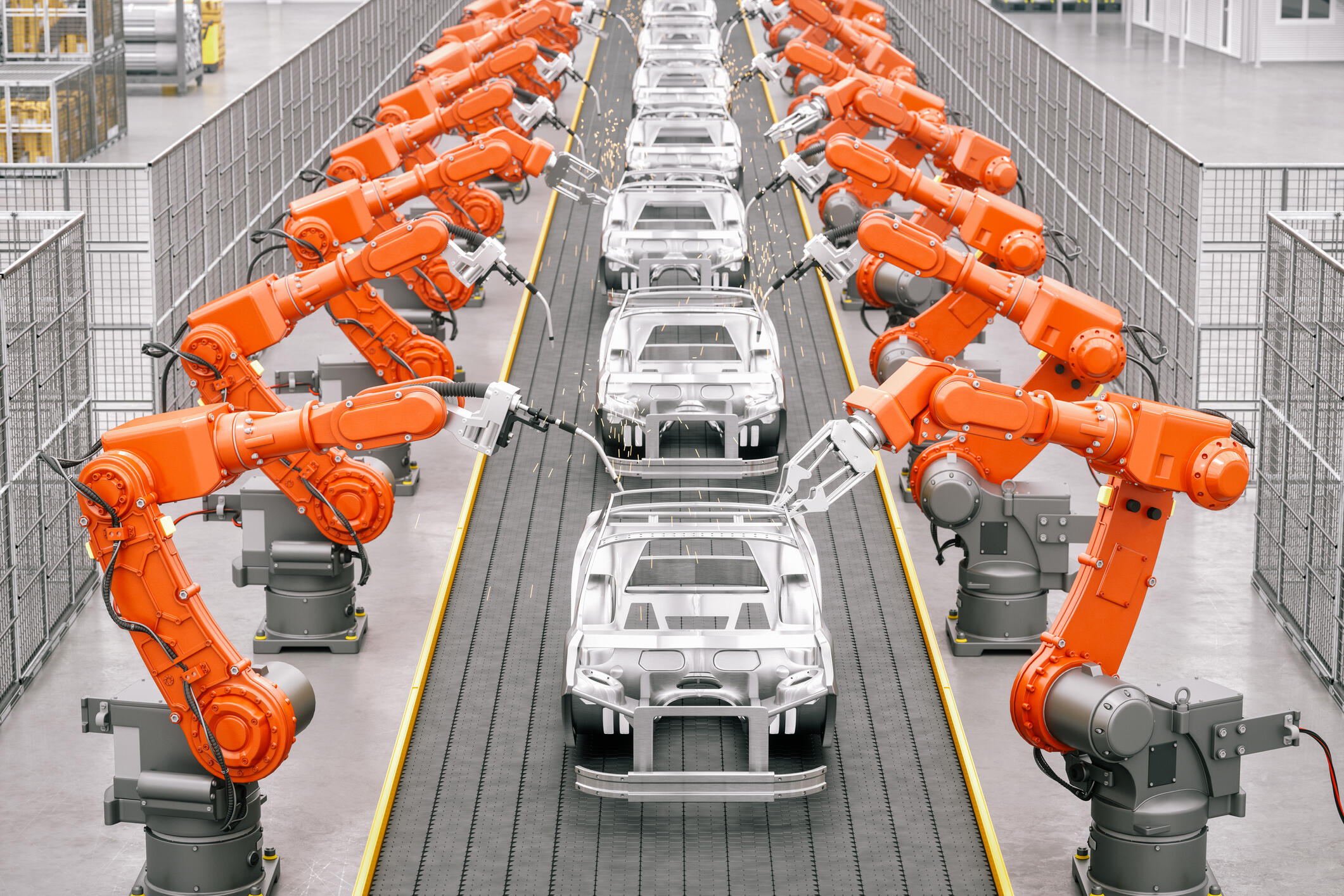Industrieroboter an der Montagelinie einer Automobilfabrik